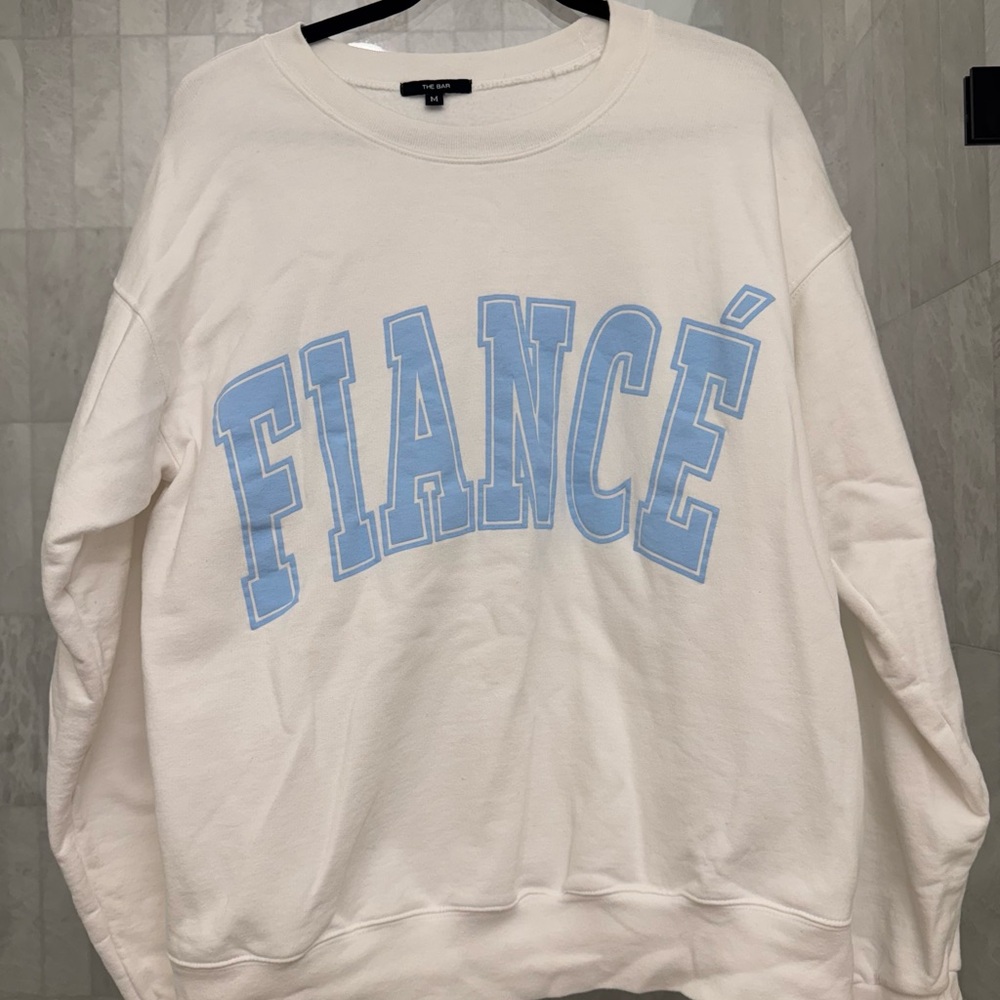 The Bar White Sweatshirt with Blue FIANCE Accents